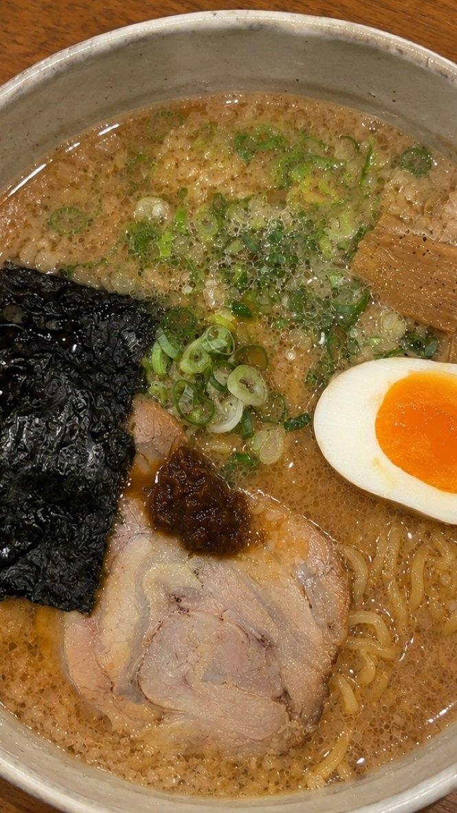 TikTok-style video still of a tonkotsu ramen bowl