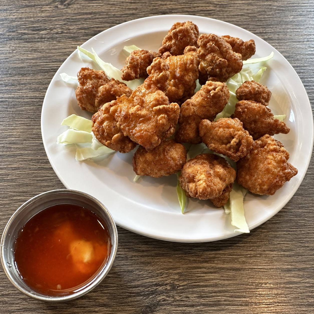 Crispy Japanese chicken karaage with cabbage and sweet-and-sour dipping sauce