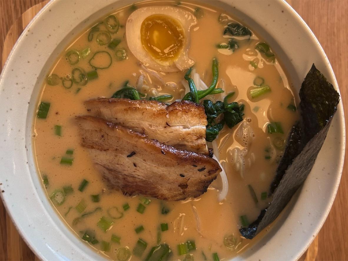 Tonkotsu ramen with chashu, a marinated egg, scallions, and nori